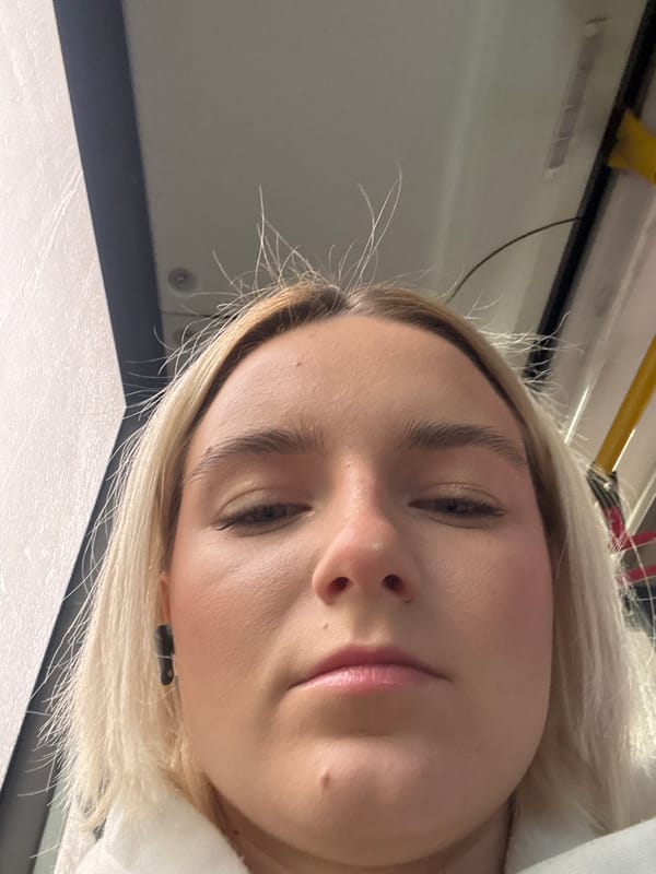 Woman takes early morning selfies on Saint Petersburg transit