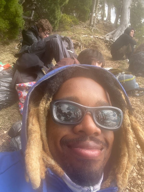 Hikers rest during mountain excursion near Chichilianne, France