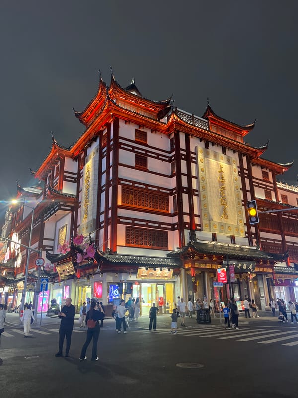 Traditional Chinese building with golden plaque documented in Shanghai
