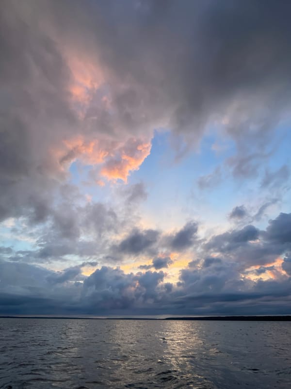 Stormy evening sky over a Russian lake shore