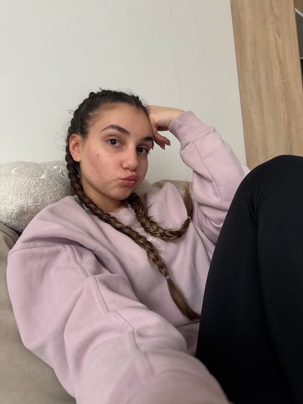 Woman relaxing on sofa in Sofia home setting