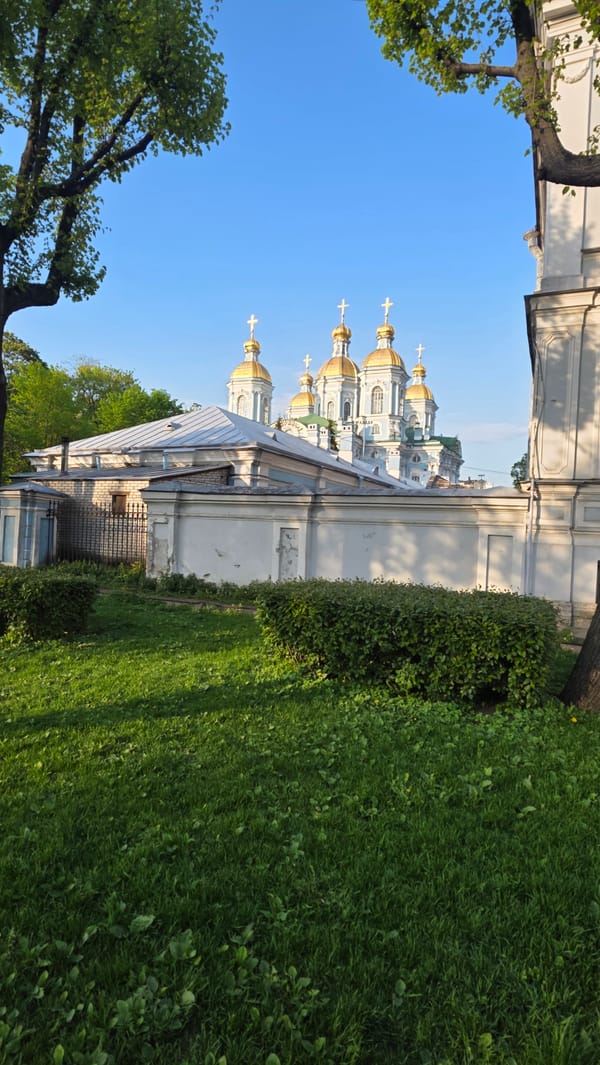 Tourist captures Saint Petersburg's iconic cathedrals during afternoon walkabout