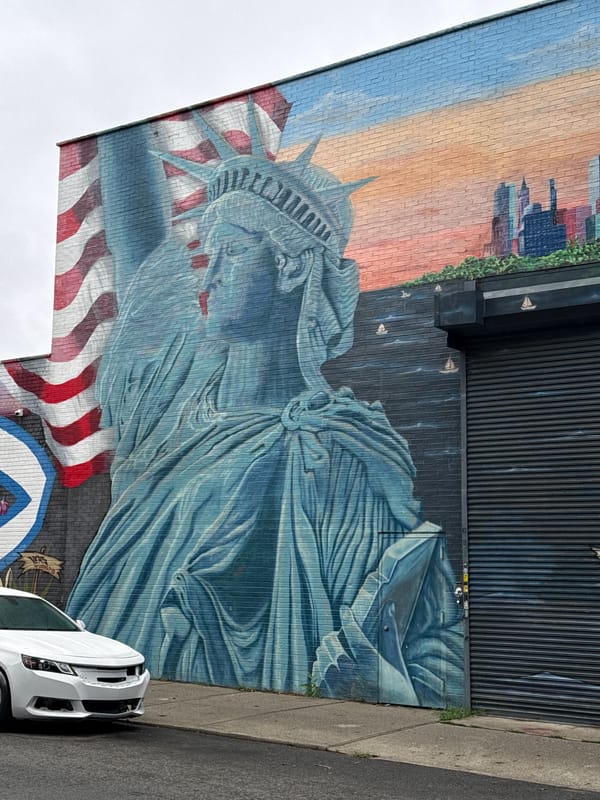 Statue of Liberty mural on a New York brick building