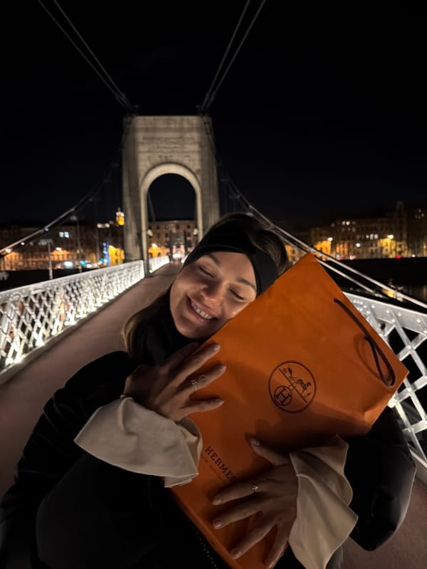Evening bridge gathering captured in Lyon with city backdrop