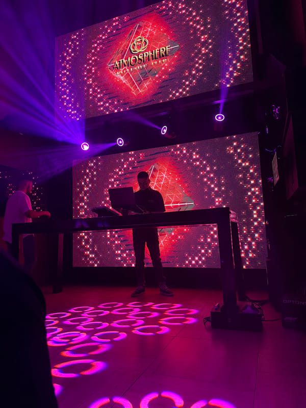 DJ performs at Atmosphere nightclub with digital displays