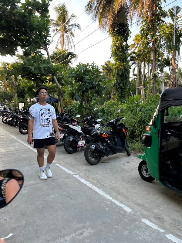 Daily life scene captured near motorcycles and store in General Luna