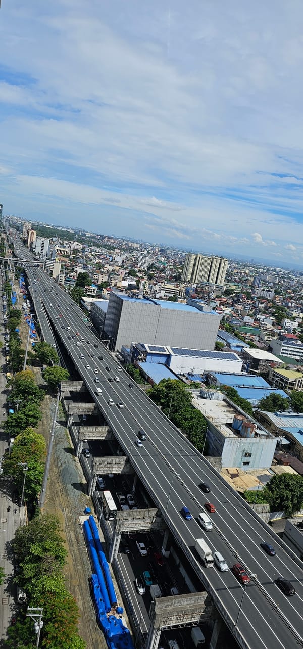 High-angle views of Makati's highways, towers, and skyline