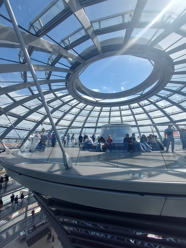 Tourist explores Reichstag dome and Berlin government district