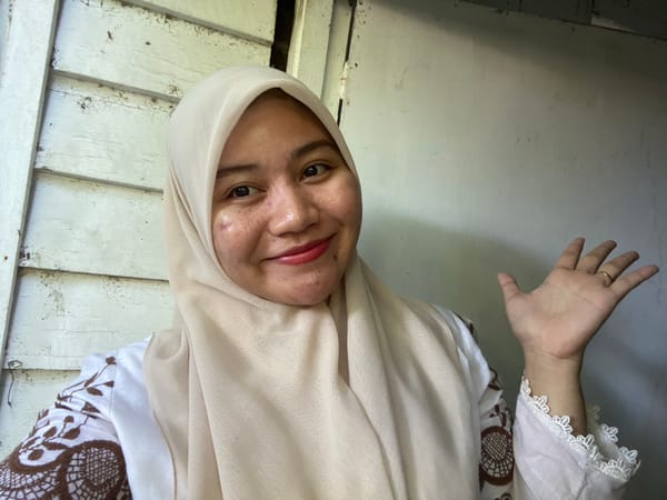 Selfies and surroundings at a weathered outdoor spot in Banjarbaru