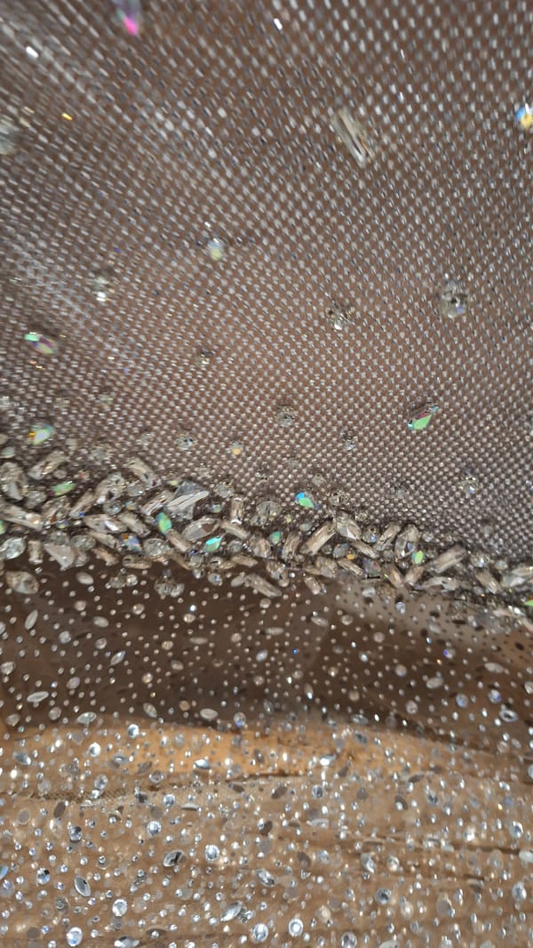 Close-up documentation of embellished fabrics and plush toy in Bulgaria