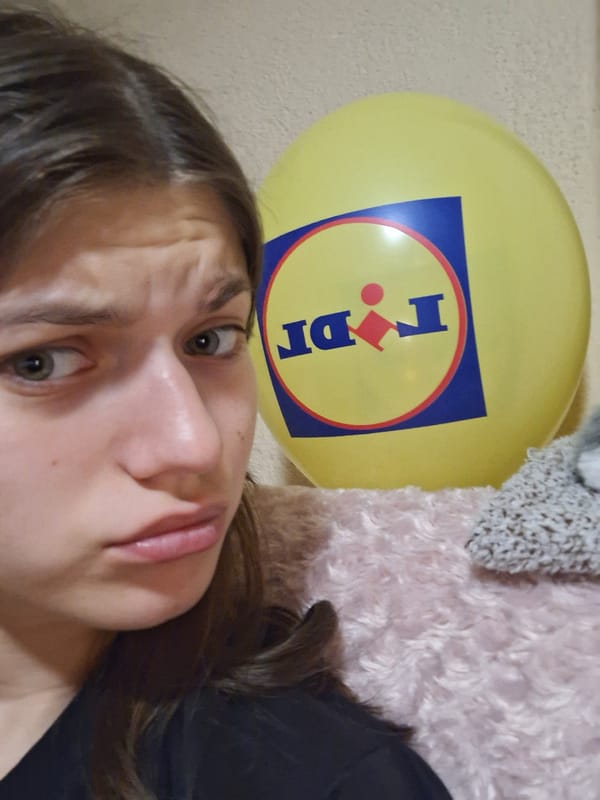 Woman takes selfie with colorful balloon in Panagyurishte