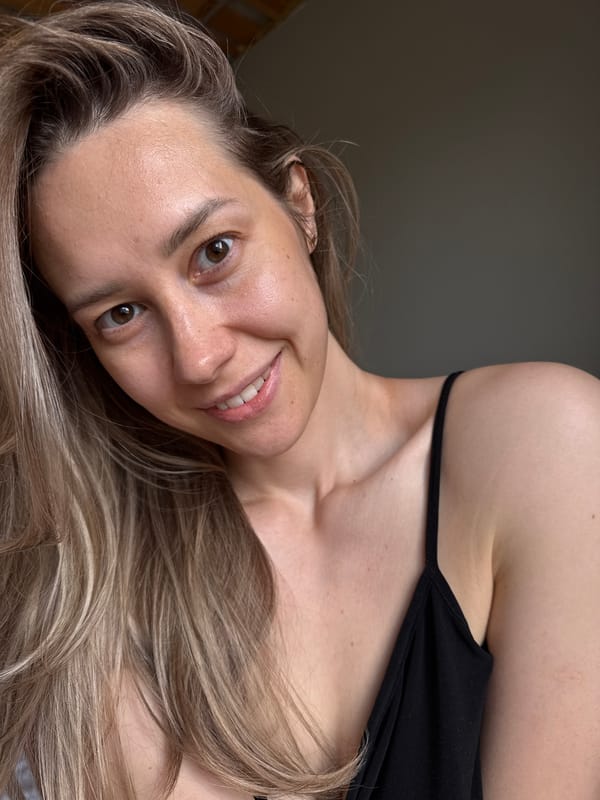 Woman photographed in multiple portraits in Chaikovsky indoor setting