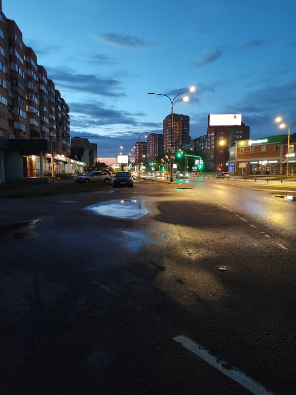 Wet city streets at dusk, multiple angles