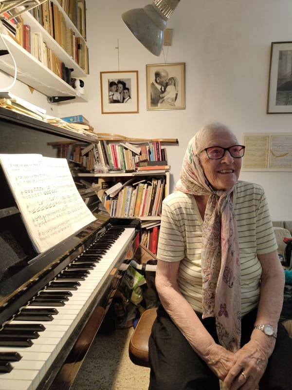 Playing a sonata at a piano in a Jerusalem home