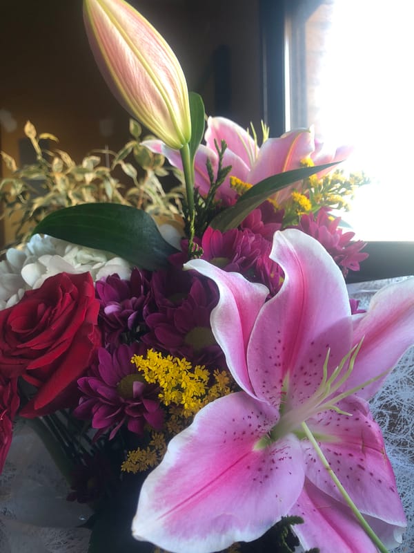 Witness documents flowers and caged bird in unknown location