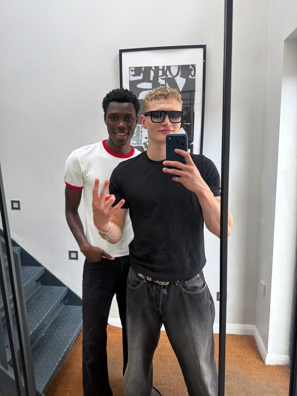 Mirror selfie in a modern London apartment