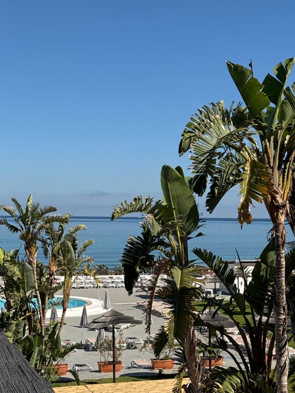 Sunny morning at a Sicilian coastal resort overlooking the Mediterranean