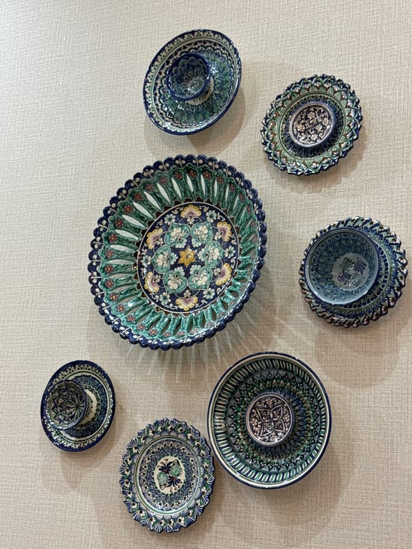 Traditional ceramics and hotel breakfast documented in Samarkand