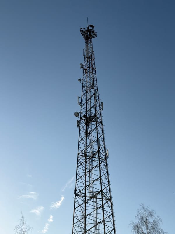 Infrastructure towers documented under clear skies in Chaikovsky