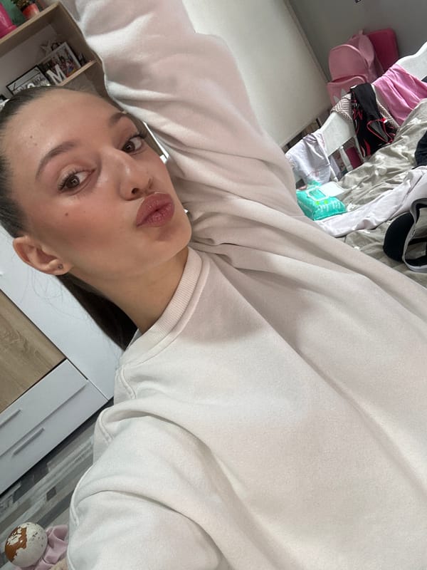 Woman Takes Series of Selfies in Pernik Home