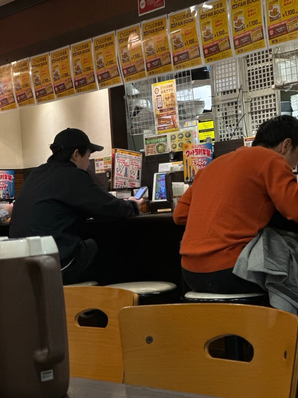 Early morning diners observed at Shibuya restaurant counter