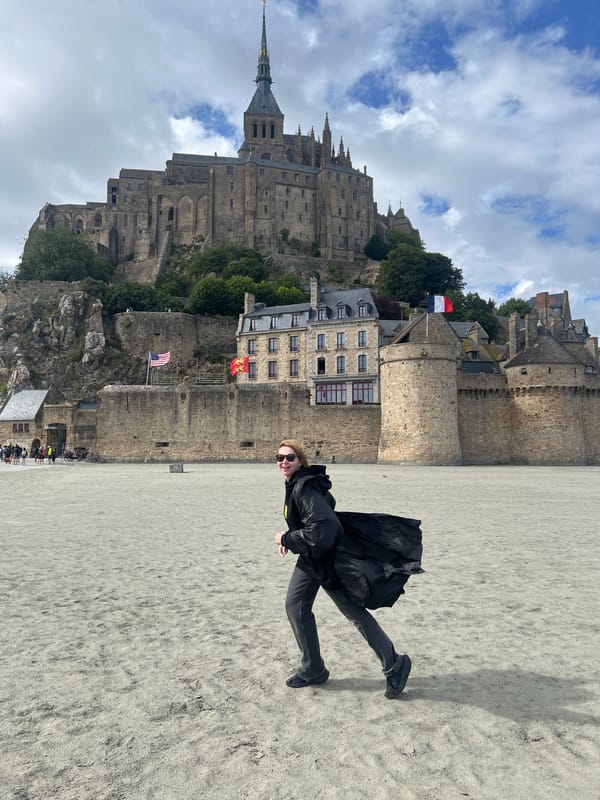 Afternoon scenes captured at Mont-Saint-Michel: runner, nesting seagulls, architecture