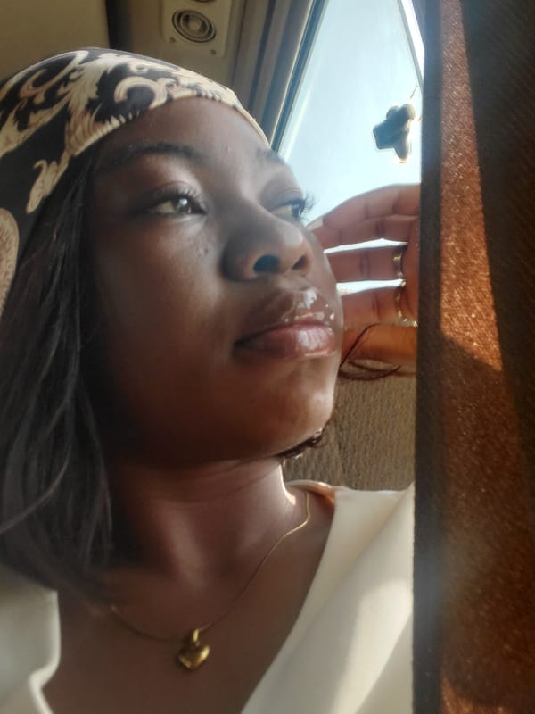 Woman takes morning selfie in Gwagwada, Nigeria