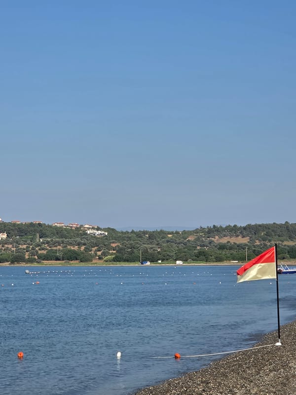 Quiet morning on Seferihisar's Aegean pebble beach