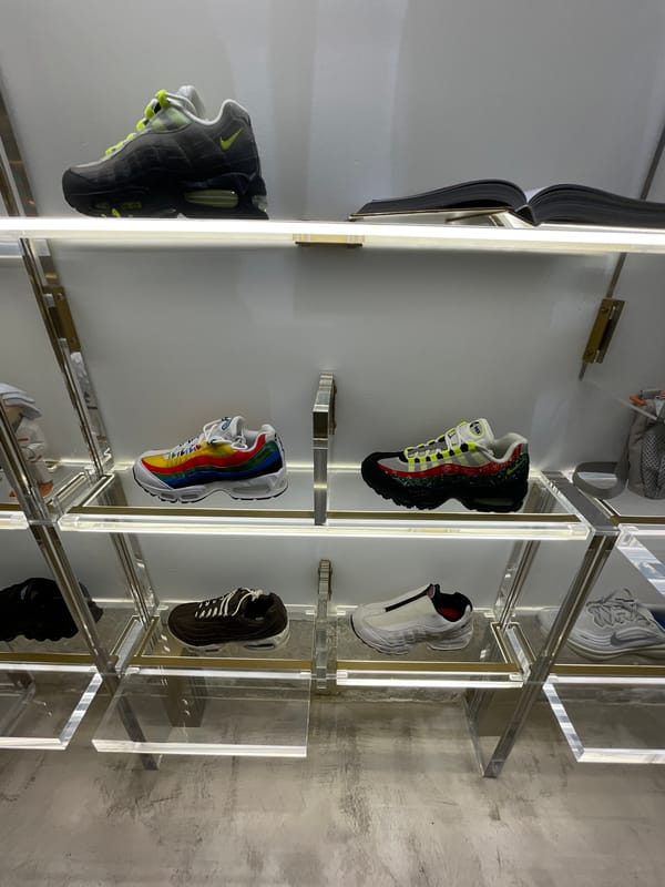 Tourist documents Nike displays and narrow Barcelona streets