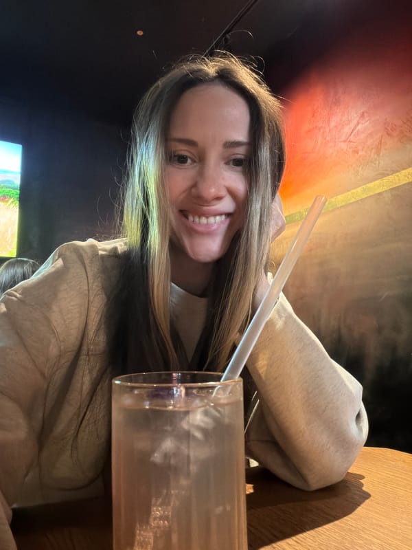 Woman enjoys sushi lunch at Japanese restaurant in Khimki