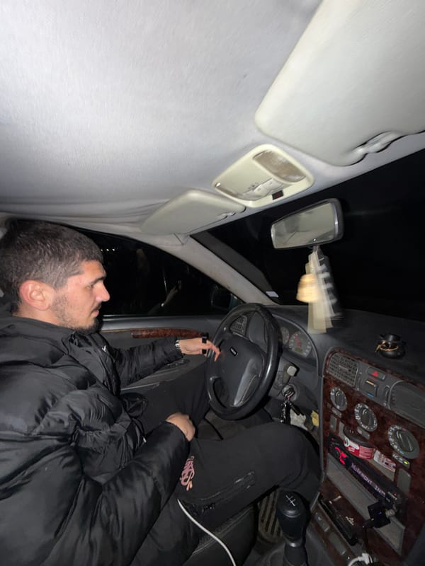 Man rests in driver's seat of car in Valchedram