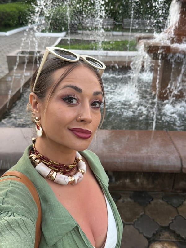 Woman takes selfies at Krasnoyarsk park fountain