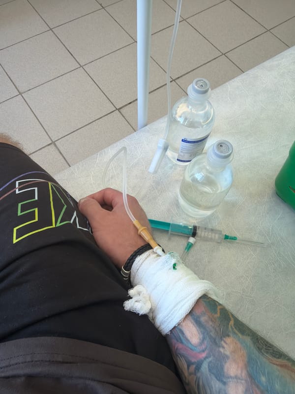 Patient receives IV treatment while enjoying latte in Chaikovsky