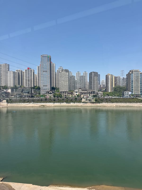 Dawn cityscape captured in Yuzhong District waterfront