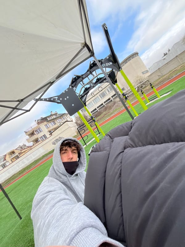 Person takes selfie wearing hoodie and face covering in Sofia