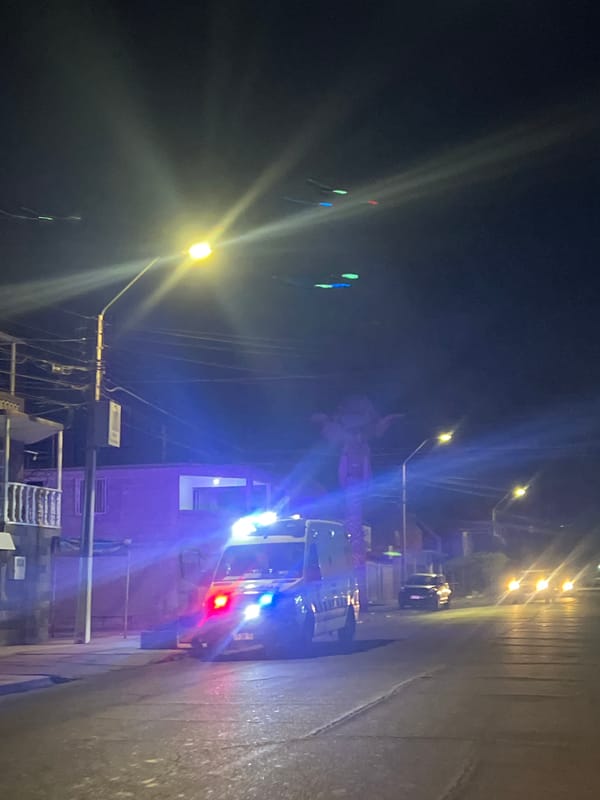Police vehicle with emergency lights spotted on Arica street