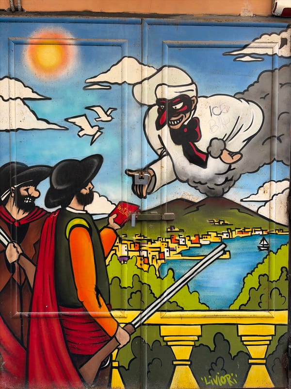 Street art featuring comedic figures documented on Naples door