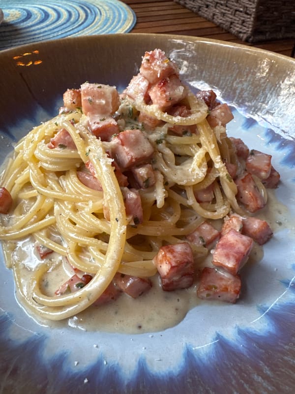 Pasta dishes photographed at outdoor restaurant in Thailand