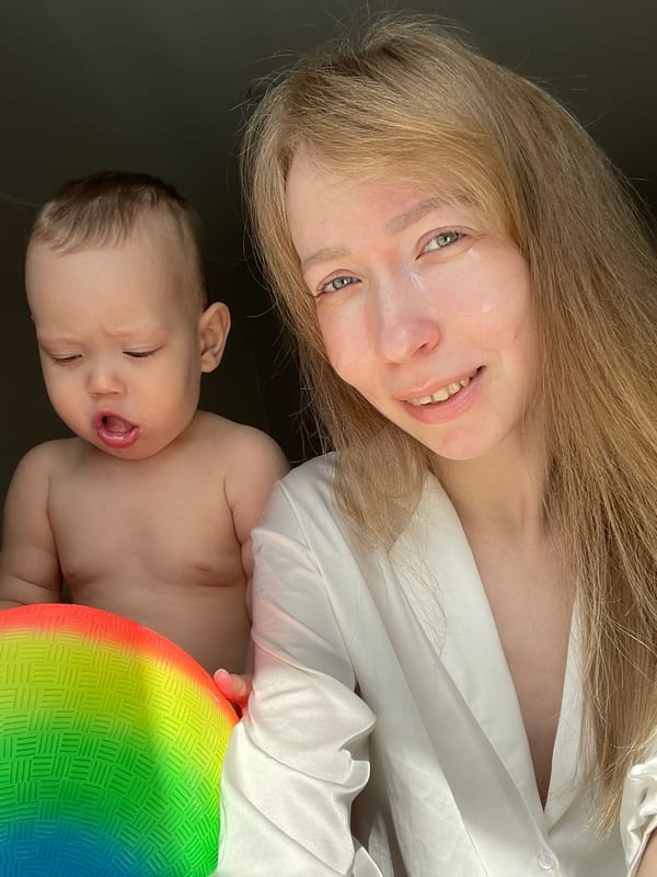 Mother and infant photographed in tender moments, Perm Russia