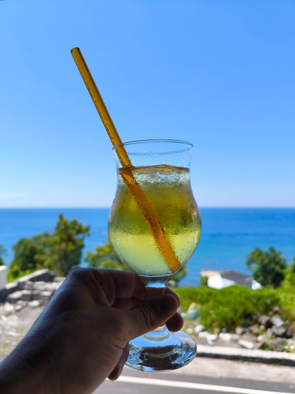 Cold beverage enjoyed at Indonesian coastal location
