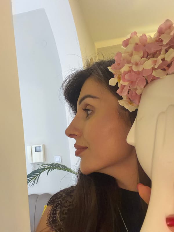Woman takes multiple selfies indoors in Budva Montenegro