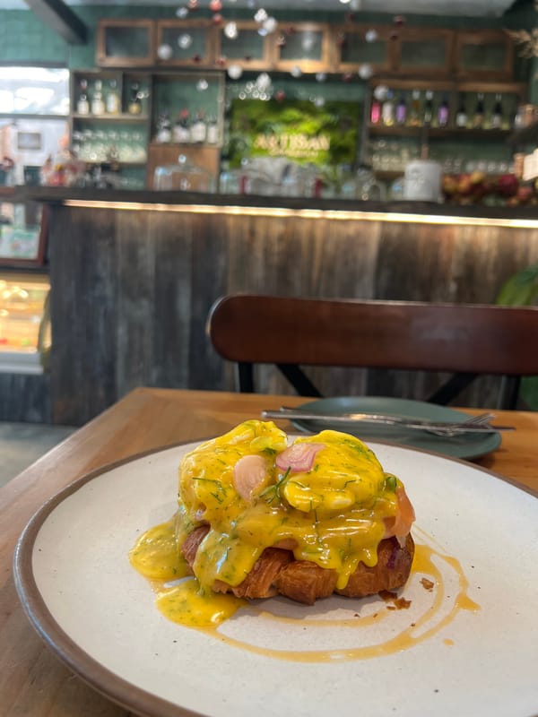 Breakfast dish documented on wooden table in Nha Trang