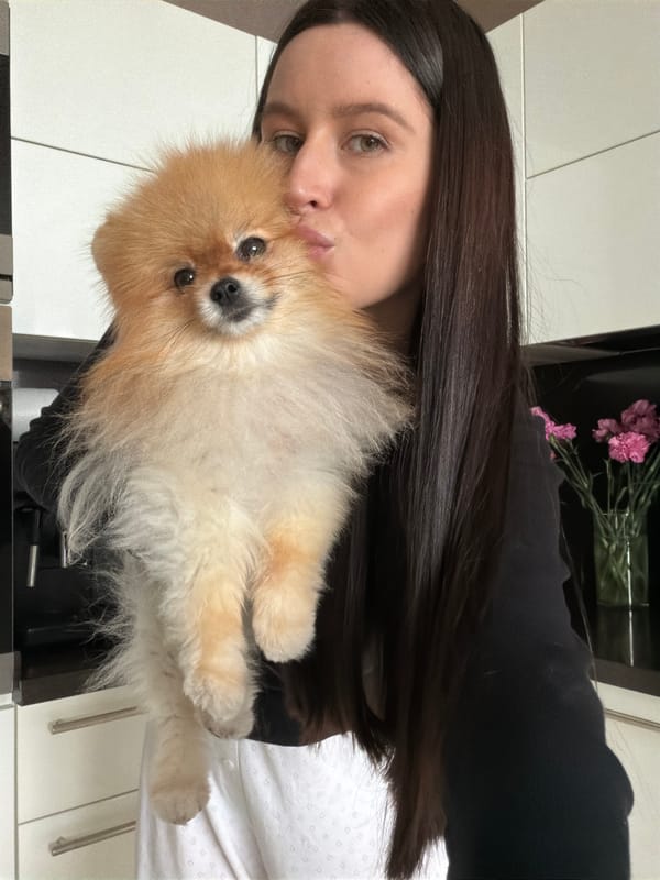 Woman takes selfie with fluffy dog in Khimki