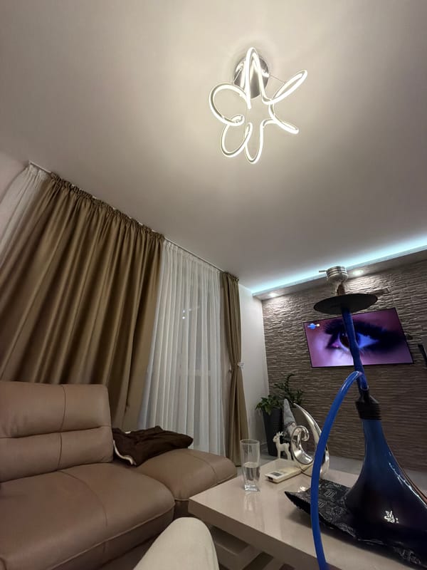 Young man relaxing in modern living room captured