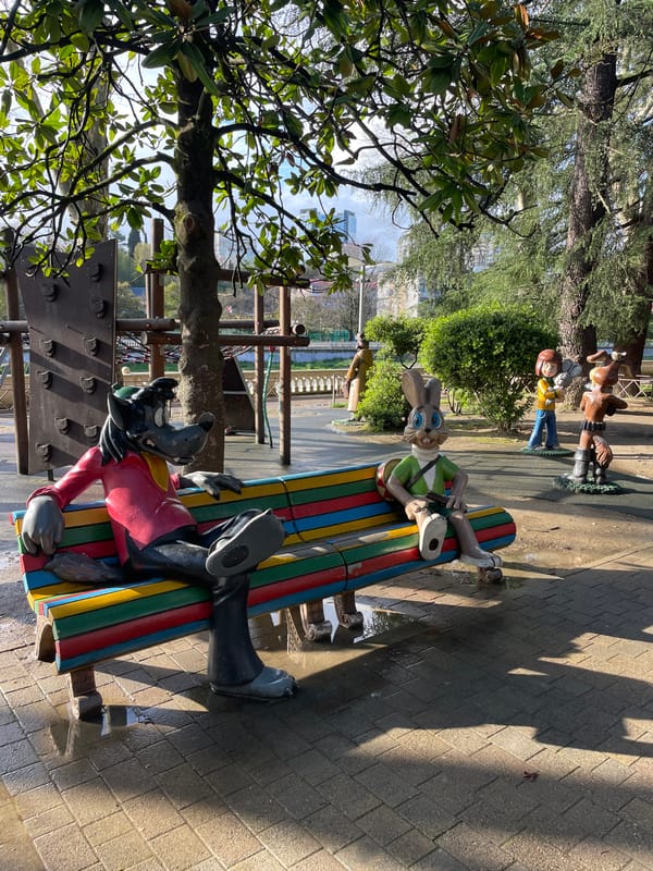 Pedestrians explore Sochi's riverfront parks and walkways