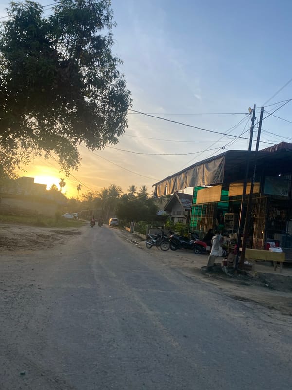 Sunset journey documented through Kubu, Indonesia roads and landmarks