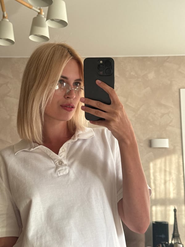 Woman takes playful mirror selfies in Saratov apartment