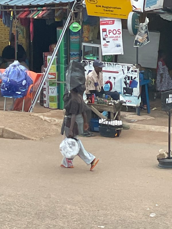 Street-level hustle in a busy African urban market
