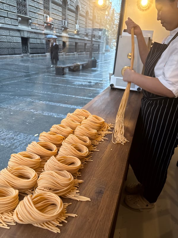 Italian restaurant pasta preparation and dining service documented
