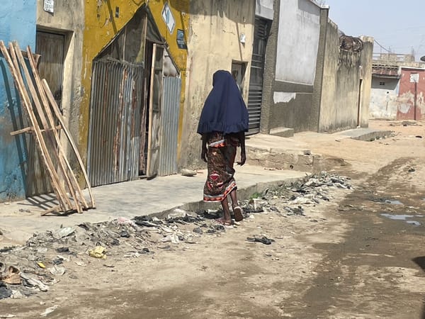 Daily street life documented in unknown urban neighborhood
